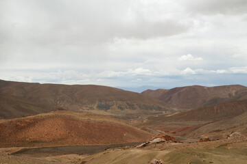 Desert landscape. View of the road across the arid mountains.