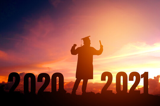 2021 New year Silhouette young man graduation in 2020 years education congratulation concept ,Freedom and Happy new year