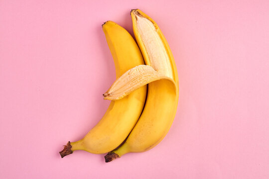 Sleeping And Hugging Banana Couple. Concept Of Gay Relationship. Peeling Banana Resembles A Hugging Hand.