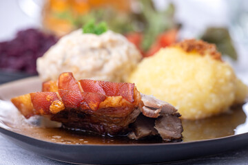 bavarian roasted pork with different dumplings