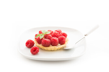 Mini tart with raspberry berries isolated on a white background