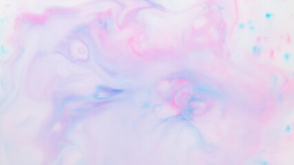 Fototapeta na wymiar Fluid art texture. Pink blue background from liquid. Photography of colored spots on liquid. Abstract pattern