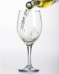 White wine pouring into glass