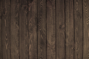 Fototapeta na wymiar solid dark brown wood background. background of dark wooden boards
