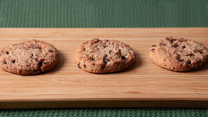 Cookies are placed on a wooden board