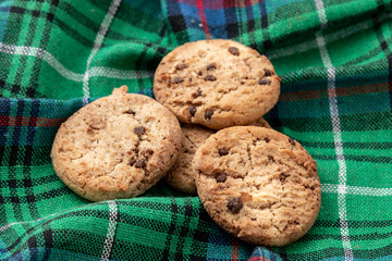 Cookies on a checkered green tablecloth