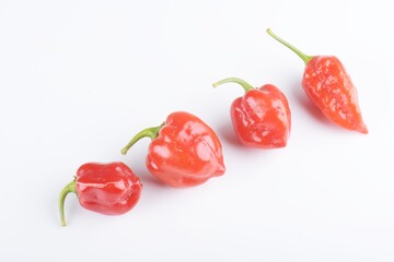 Fresh habanero peppers, isolated on white