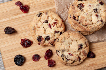 Cookies with chocolate and cranberries on the breakfast table