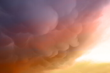 Naklejka na ściany i meble colorful sky with mammatus clouds
