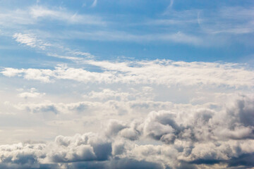 Fototapeta premium multi-colored layered clouds of the lower tier