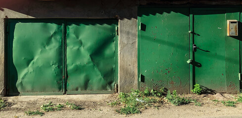 Old fashioned garage door. Hand up and no autimatic garage door. Close- up photo.