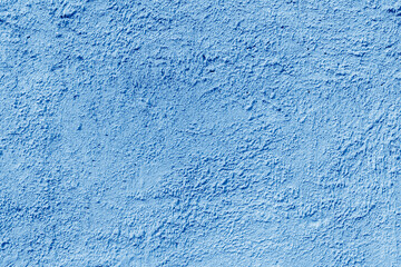 Fototapeta na wymiar Abstract rough blue texture. Architectural abstract background. Plastered building wall.