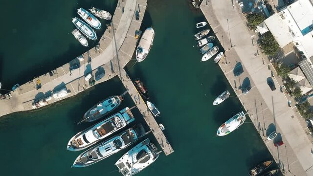 Aerial view of the pier with Paros island on a background Naousa village