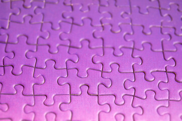 background of correctly placed colored puzzle pieces