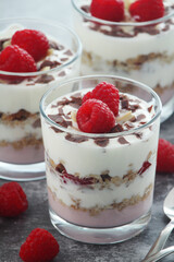 Granola with yogurt trifles with raspberry
