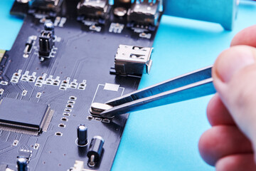 technician worker repairing electronic hardware. digital device service concept