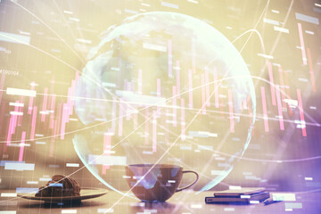 Double exposure of forex chart over coffee cup background in office. Concept of financial analysis and success.