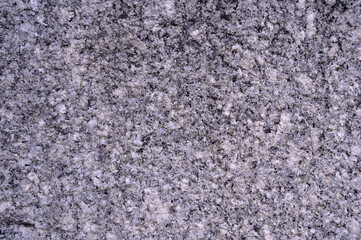 Abstract background of grey tiled walkway in a park