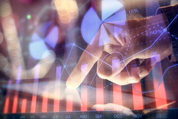 Multi exposure of man's hands holding and using a phone and financial chart drawing. Market analysis concept.