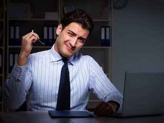 Tired and exhausted helpdesk operator during night shift