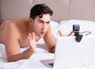 Young sexy man in online dating concept