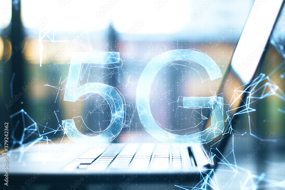 Poster laptop on desktop with abstract 5g network hologram.