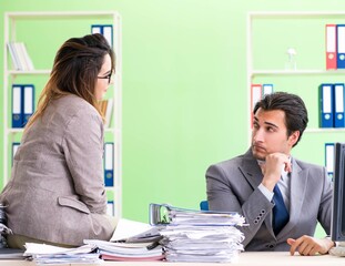 Two colleagues working in the office