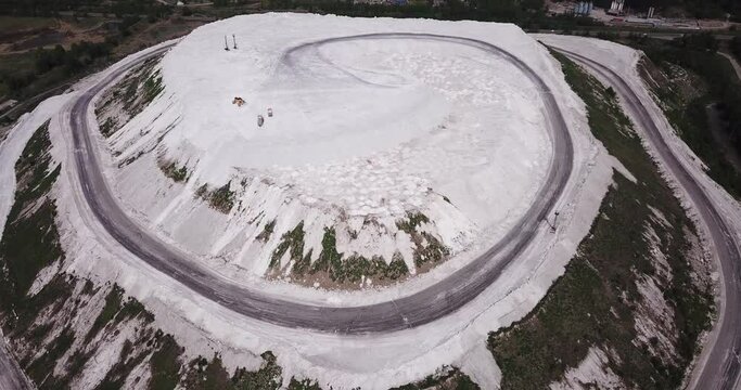 View from drone of unusual White Mountain in Podmoskovye, Russia - large open air slagheap of Lopatinsky phosphate mine 