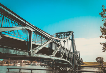 Kaiser Wilhelm Bridge in Wilhelmshaven, Germany with a cloudy sky - obrazy, fototapety, plakaty