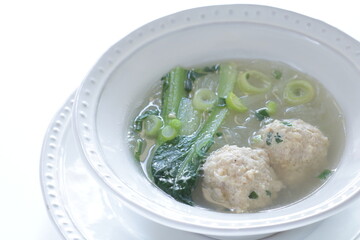 Chinese food, meat ball and glass noodles in green leaves vegetable  soup