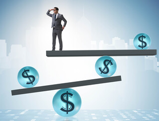 Businessman balancing in financial dollar concept