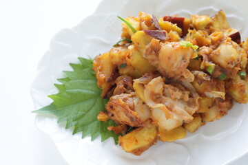 Korean food, braised sweet potato and scallop with copy space