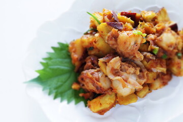 Korean food, braised sweet potato and scallop with copy space