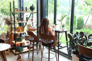 new normal lifestyle , woman using mobile phone for talking with her friend