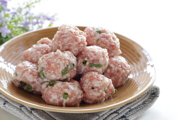 homemade Chinese pork meat ball on brown dish
