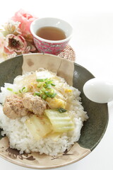Chinese food, cabbage and meat ball braised on rice