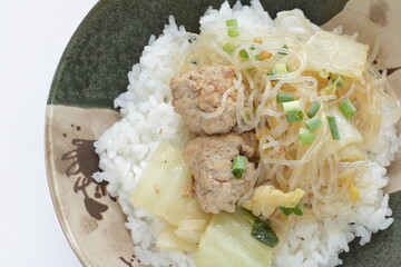 Chinese food, cabbage and meat ball braised on rice