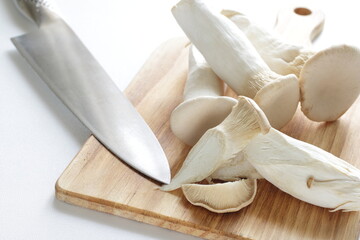 Japanese Eringi mushroom on chopping board