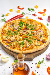Pizza with chicken, mushrooms and sweet pepper on wooden plate