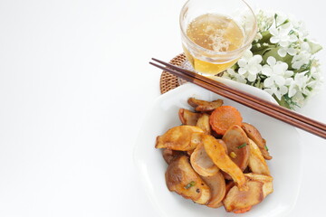 Chinese food, sausage and Eringi mushroom stir fried with iced tea
