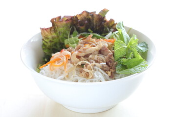Vietnamese food, grilled pork and rice noodle herbal salad