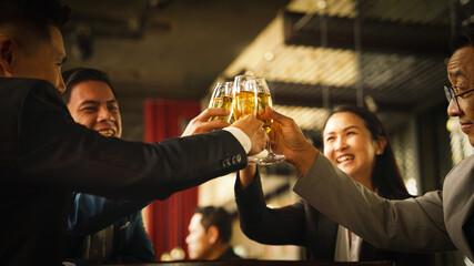 businesspeople toasting and clinking wine or champagne together