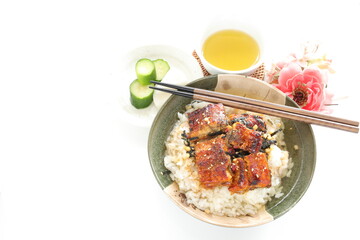 Japanese food, grilled uragi eel fish on green tea rice