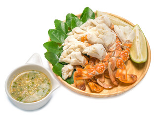 steamed crab with spicy seafood sauce on the wooden plate.steamed blue crab with spicy dip, thai style, seafood.