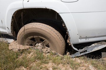 SUV got stuck in the mud, wheel closeup