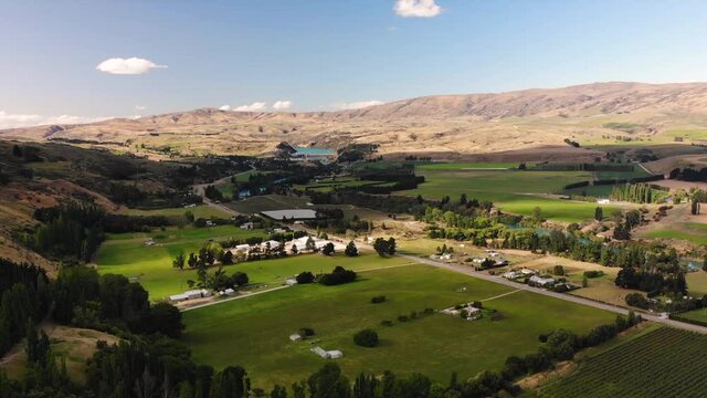 New Zealand agriculture landscape along Clutha River near Roxburgh, aerial shot