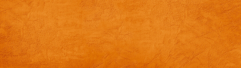Abstract orange yellow brown background. Toned cement plaster wall surface. Autumn, Thanksgiving...