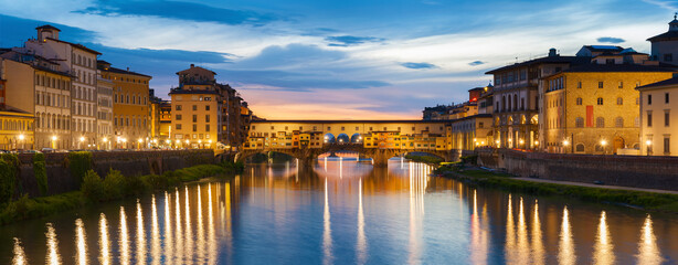 Ponte Vecchio - the bridge-market in the center of Florence, Tuscany, Italy at dusk