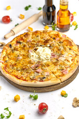 Delicious pizza with bacon, mushrooms, processed cheese on wooden plate