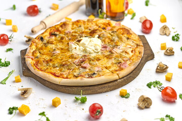 Delicious pizza with bacon, mushrooms, processed cheese on wooden plate